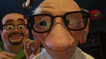Movie still from “Toy Story 2” (1999), directed by Lee Unkrich – An image of a man with glasses and an old man with glasses; Extreme Close Up shot, Over the shoulder angle