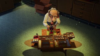 Movie still from “Toy Story 2” (1999), directed by Lee Unkrich – An old man sitting in front of a table; Wide shot, High angle