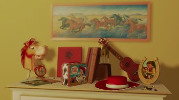 Movie still from “Toy Story 2” (1999), directed by Lee Unkrich – A cowboy hat , guitar , cowboy boots and a cowboy hat on a table; Close Up shot, High angle