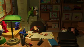 Movie still from “Toy Story 2” (1999), directed by Lee Unkrich – A desk that has a lot of stuff on it; Extreme Wide shot, High angle