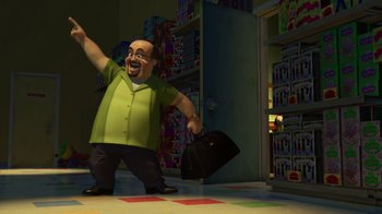 Movie still from “Toy Story 2” (1999), directed by Lee Unkrich – An animated man with a briefcase in a room; Wide shot, High angle