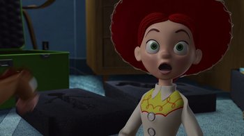 Movie still from “Toy Story 2” (1999), directed by Lee Unkrich – A toy story character with a surprised look on its face; Close Up shot, Over the shoulder angle