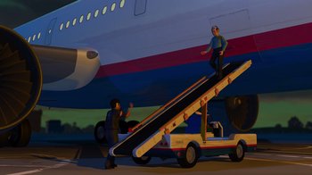 Movie still from “Toy Story 2” (1999), directed by Lee Unkrich – A man is standing on the side of an airplane; Wide shot, Low angle