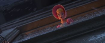 Movie still from “Toy Story 4” (2019), directed by Josh Cooley – A toy doll wearing a pink dress and a pink hat; Medium shot, Low angle