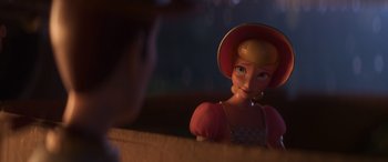 Movie still from “Toy Story 4” (2019), directed by Josh Cooley – A doll is sitting in front of a mirror; Close Up shot, Over the shoulder angle