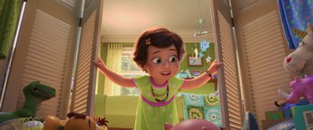 Movie still from “Toy Story 4” (2019), directed by Josh Cooley – A little girl standing in front of a mirror in a room; Medium shot, Over the shoulder angle