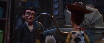 Movie still from “Toy Story 4” (2019), directed by Josh Cooley – A toy story character talking to another character in a room; Medium shot, Over the shoulder angle