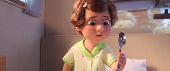 Movie still from “Toy Story 4” (2019), directed by Josh Cooley – A cartoon girl with a fork in her hand; Close Up shot, Over the shoulder angle