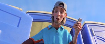 Movie still from “Toy Story 4” (2019), directed by Josh Cooley – A man in a blue shirt and a hat; Medium shot, Low angle