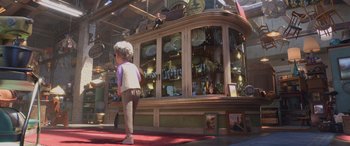 Movie still from “Toy Story 4” (2019), directed by Josh Cooley – A child standing in front of a store window; Wide shot, Over the shoulder angle