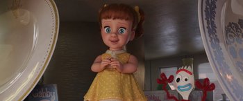 Movie still from “Toy Story 4” (2019), directed by Josh Cooley – A toy doll in a yellow polka dot dress; Close Up shot, Low angle