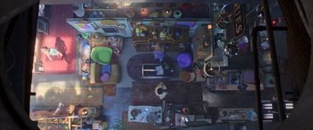 Movie still from “Toy Story 4” (2019), directed by Josh Cooley – An overhead view of a living room and kitchen; Extreme Wide shot, Overhead angle