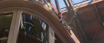 Movie still from “Toy Story 4” (2019), directed by Josh Cooley – A man standing on the side of a building; Extreme Wide shot, Low angle