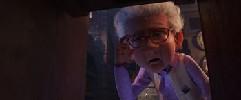Movie still from “Toy Story 4” (2019), directed by Josh Cooley – An old woman with a surprised look on her face; Close Up shot, Over the shoulder angle