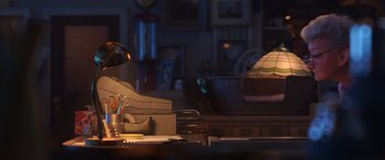 Movie still from “Toy Story 4” (2019), directed by Josh Cooley – A room with a table and chairs and a lamp; Wide shot, High angle