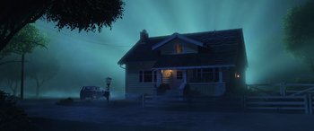 Movie still from “Toy Story 4” (2019), directed by Josh Cooley – A house in the dark with a light shining on it's windows; Extreme Wide shot, Low angle