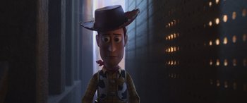 Movie still from “Toy Story 4” (2019), directed by Josh Cooley – A doll wearing a cowboy hat; Close Up shot, Over the shoulder angle