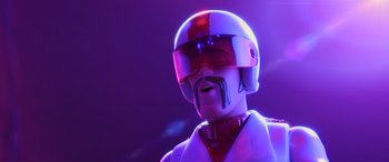 Movie still from “Toy Story 4” (2019), directed by Josh Cooley – A robot's face in a purple light; Close Up shot, Low angle