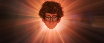 Movie still from “Toy Story 4” (2019), directed by Josh Cooley – An animated face of a man with glasses and curly hair in front of an orange background; Close Up shot, Low angle
