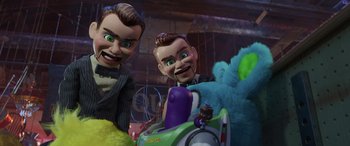Movie still from “Toy Story 4” (2019), directed by Josh Cooley – Two toy dolls with green eyes and green hair; Medium shot, Low angle