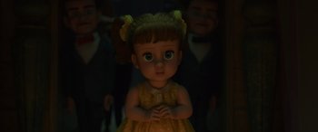 Movie still from “Toy Story 4” (2019), directed by Josh Cooley – A little girl is standing in the dark with her arms crossed; Close Up shot, Over the shoulder angle