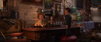 Movie still from “Toy Story 4” (2019), directed by Josh Cooley – A table that has some toys on top of it; Wide shot, Over the shoulder angle