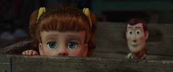 Movie still from “Toy Story 4” (2019), directed by Josh Cooley – A doll's head with a yellow bow on it; Close Up shot, High angle