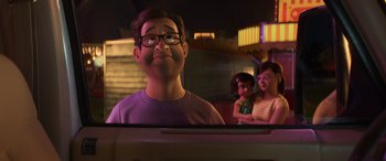 Movie still from “Toy Story 4” (2019), directed by Josh Cooley – A man with glasses looking out of a car window; Medium shot, Over the shoulder angle