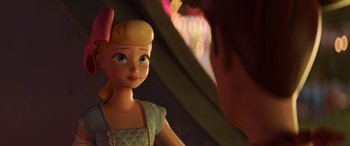 Movie still from “Toy Story 4” (2019), directed by Josh Cooley – A doll's face in front of a mirror; Close Up shot, Over the shoulder angle