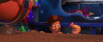 Movie still from “Toy Story 4” (2019), directed by Josh Cooley – A man and a woman are looking over the ground; Wide shot, Over the shoulder angle