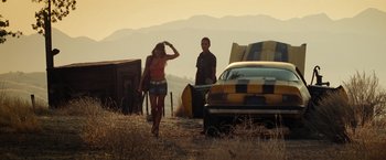 Movie still from “Transformers” (2007), directed by Michael Bay – Wide shot, Low angle