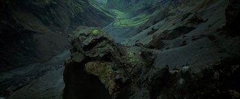 Movie still from “Transformers: Age of Extinction” (2014), directed by Michael Bay – A view of a valley from a mountain side; Extreme Wide shot, High angle