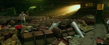 Movie still from “Transformers: Age of Extinction” (2014), directed by Michael Bay – An empty auditorium with a lot of seats in it; Extreme Wide shot, High angle