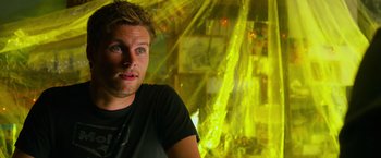 Movie still from “Transformers: Age of Extinction” (2014), directed by Michael Bay – A person in a black shirt; Close Up shot, Over the shoulder angle