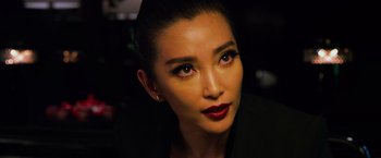 Movie still from “Transformers: Age of Extinction” (2014), directed by Michael Bay – A person wearing a black jacket; Close Up shot, Low angle