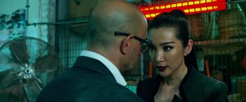 Movie still from “Transformers: Age of Extinction” (2014), directed by Michael Bay – A man and a woman are looking at one another; Close Up shot, Over the shoulder angle