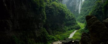 Movie still from “Transformers: Age of Extinction” (2014), directed by Michael Bay – A view of a valley with a river running through it; Extreme Wide shot, High angle