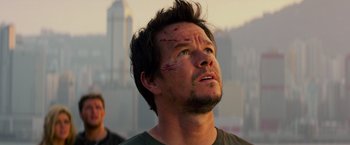 Movie still from “Transformers: Age of Extinction” (2014), directed by Michael Bay – A person with blood on his face; Close Up shot, Low angle
