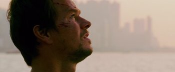Movie still from “Transformers: Age of Extinction” (2014), directed by Michael Bay – A person looking up at the sky; Close Up shot, Low angle