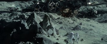 Movie still from “Transformers: Dark of the Moon” (2011), directed by Michael Bay – An image of an astronaut on the surface of the moon; Extreme Wide shot, Overhead angle