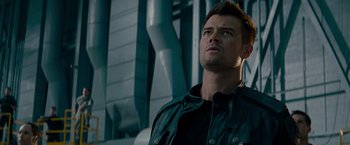 Movie still from “Transformers: Dark of the Moon” (2011), directed by Michael Bay – A person wearing a leather jacket; Close Up shot, Low angle