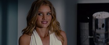 Movie still from “Transformers: Dark of the Moon” (2011), directed by Michael Bay – A person with long hair; Close Up shot, Over the shoulder angle