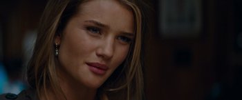 Movie still from “Transformers: Dark of the Moon” (2011), directed by Michael Bay – A woman's face with long blonde hair; Close Up shot, Over the shoulder angle