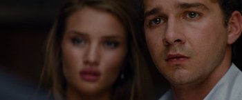Movie still from “Transformers: Dark of the Moon” (2011), directed by Michael Bay – A young woman and a young man; Close Up shot, Over the shoulder angle