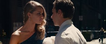 Movie still from “Transformers: Dark of the Moon” (2011), directed by Michael Bay – A man and a woman standing next to each other; Close Up shot, Over the shoulder angle