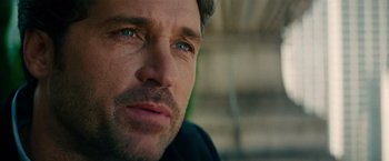 Movie still from “Transformers: Dark of the Moon” (2011), directed by Michael Bay – A person with a beard; Close Up shot, Over the shoulder angle