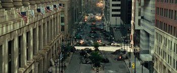Movie still from “Transformers: Dark of the Moon” (2011), directed by Michael Bay – An image of a street with a lot of debris on the street; Extreme Wide shot, High angle