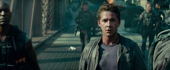 Movie still from “Transformers: Dark of the Moon” (2011), directed by Michael Bay – Shia labeouf in a scene from the movie transformers; Close Up shot, Low angle