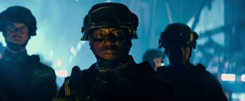 Movie still from “Transformers: Revenge of the Fallen” (2009), directed by Michael Bay – A man in a helmet and goggles is looking at the camera; Close Up shot, Low angle