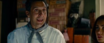 Movie still from “Transformers: Revenge of the Fallen” (2009), directed by Michael Bay – A person wearing a neck tie; Close Up shot, Low angle